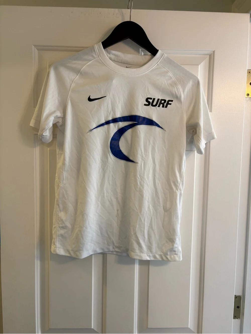 Nike Unisex Youth XL White activewear top with New England Surf soccer club logo